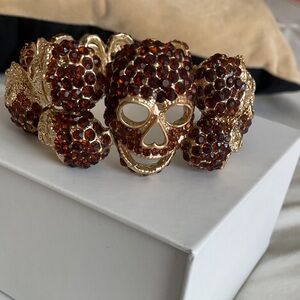GoldTone Skull Bangle with Garnet Red Rhinestones,opens &clasps for perfect fit!